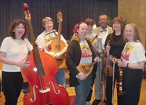 Six musicians with radio host